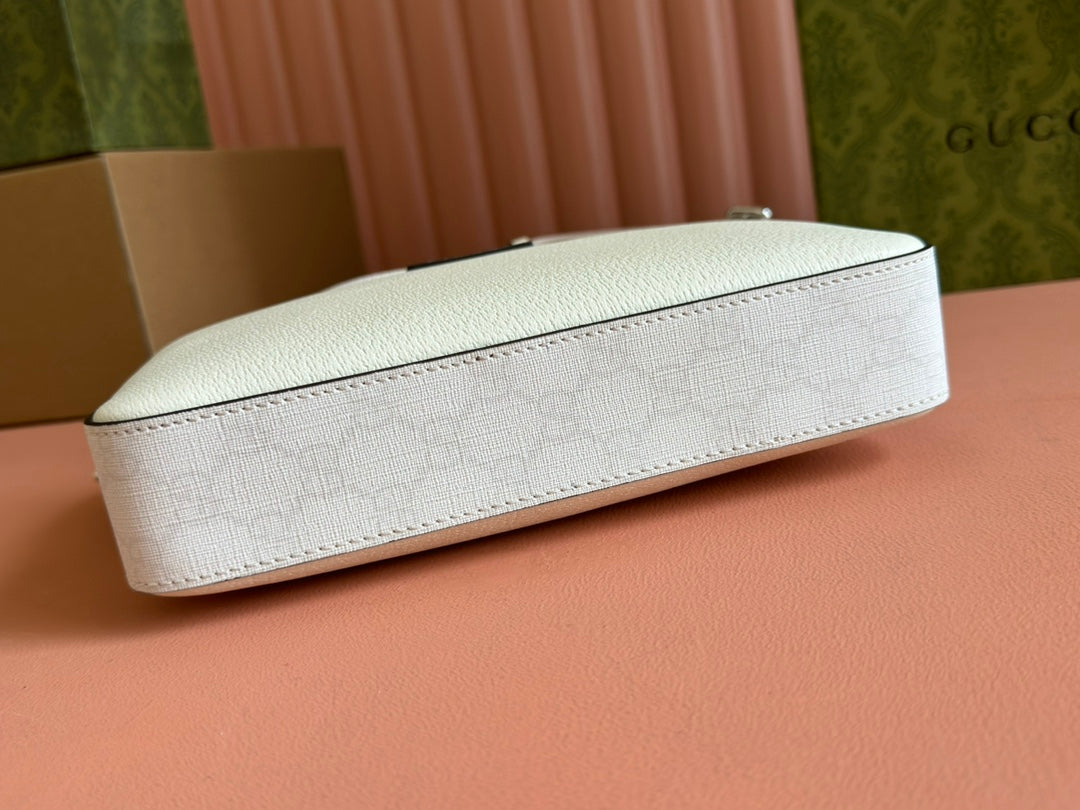 PETIT SAC BANDOULIÈRE 24 AVEC ÉTIQUETTE EN CUIR DE VEAU BLANC ET BORDURE EN TOILE