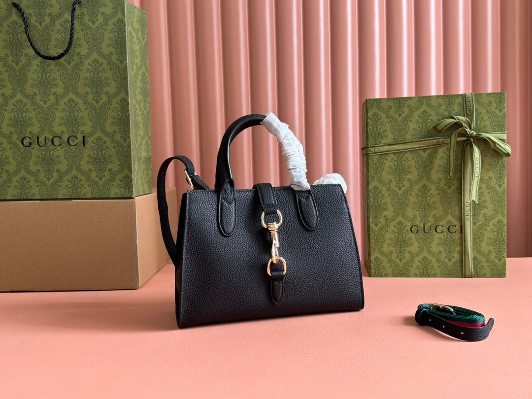 Petit sac fourre-tout Jackie 24 en cuir de veau noir et métal doré