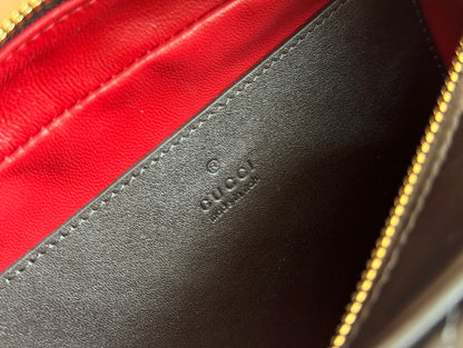 Petit sac bandoulière Marmont 24 en cuir de veau noir et métal doré