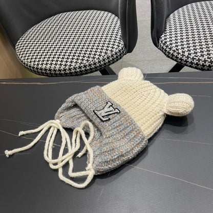 BONNET EN TRICOT AVEC DE JOLIES OREILLES EN LAINE BLANC MÉLANGÉE GRIS 403484 