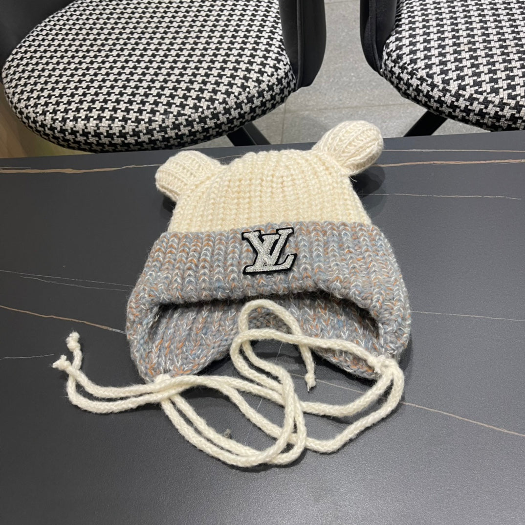 BONNET EN TRICOT AVEC DE JOLIES OREILLES EN LAINE BLANC MÉLANGÉE GRIS 403484 