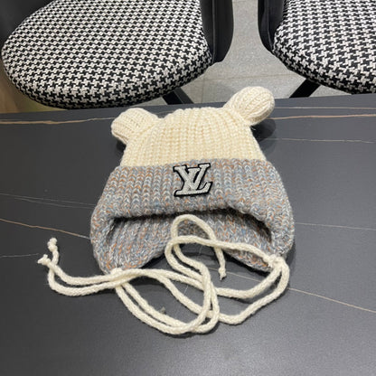 BONNET EN TRICOT AVEC DE JOLIES OREILLES EN LAINE BLANC MÉLANGÉE GRIS 403484 