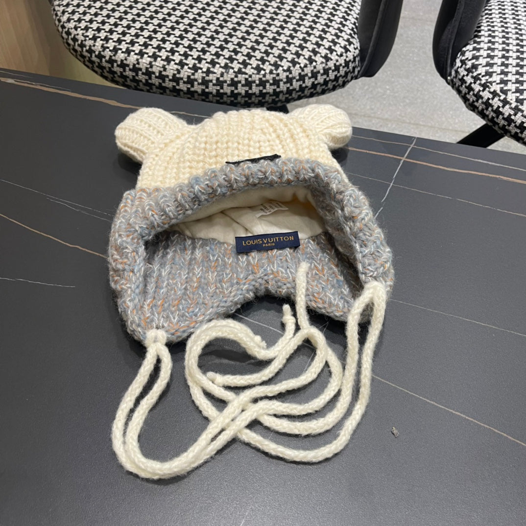 BONNET EN TRICOT AVEC DE JOLIES OREILLES EN LAINE BLANC MÉLANGÉE GRIS 403484 