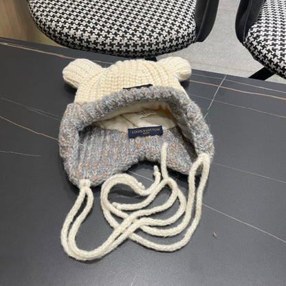 BONNET EN TRICOT AVEC DE JOLIES OREILLES EN LAINE BLANC MÉLANGÉE GRIS 403484 