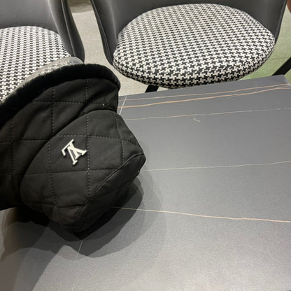 CHAPEAU BUCKET EN COTON NOIR ET FOURRURE D'AGNEAU 420923 