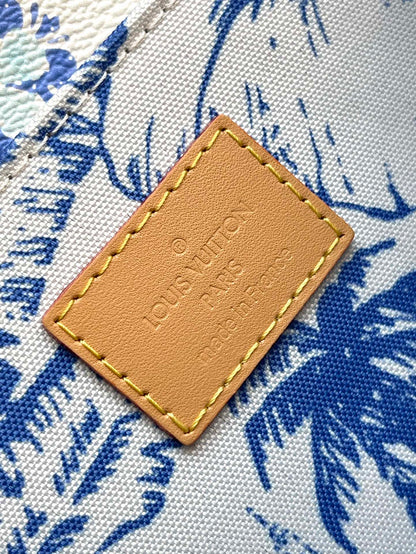 POCHETTE MÉTIS 25 EN CARREAUX MONOGRAMME BLEU LAGON TOILE QUINCAILLERIE DORÉ
