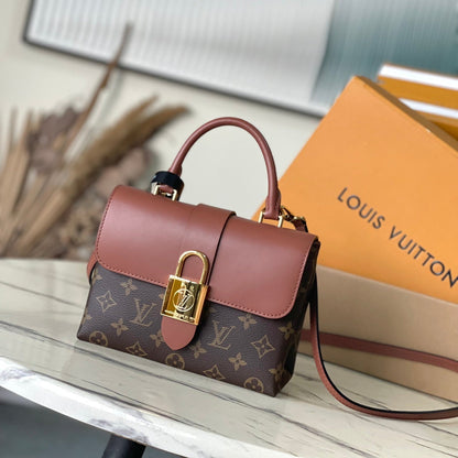 LOCKY BB 20 EN TOILE MONOGRAMME MARRON ET CUIR DE VEAU LISSE BOUCLE OR
