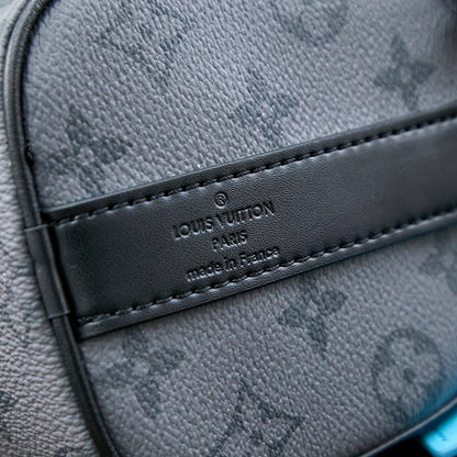 Sac bandoulière Keepall 25 pouces en cuir de veau turquoise mélangé avec toile éclipse et monogramme Gun Metal