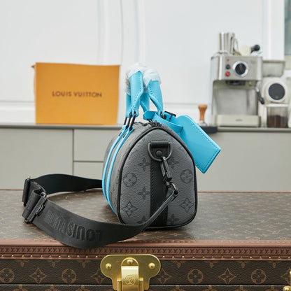 Sac bandoulière Keepall 25 pouces en cuir de veau turquoise mélangé avec toile éclipse et monogramme Gun Metal