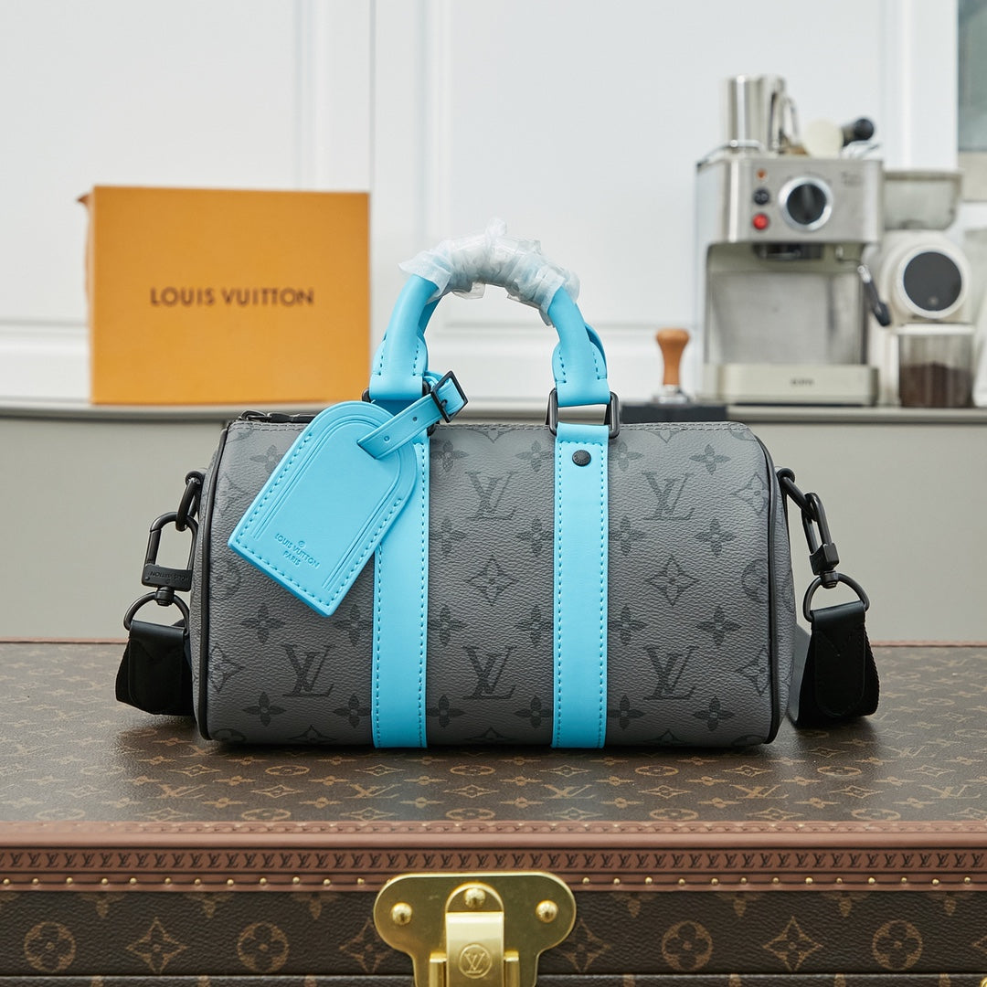 Sac bandoulière Keepall 25 pouces en cuir de veau turquoise mélangé avec toile éclipse et monogramme Gun Metal