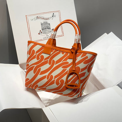 Sac HM Steeple 28 en cuir de veau marron et toile blanche et marron