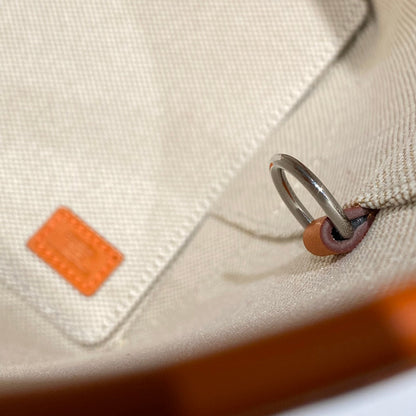 Sac HM Steeple 28 en cuir de veau marron et toile blanche et marron