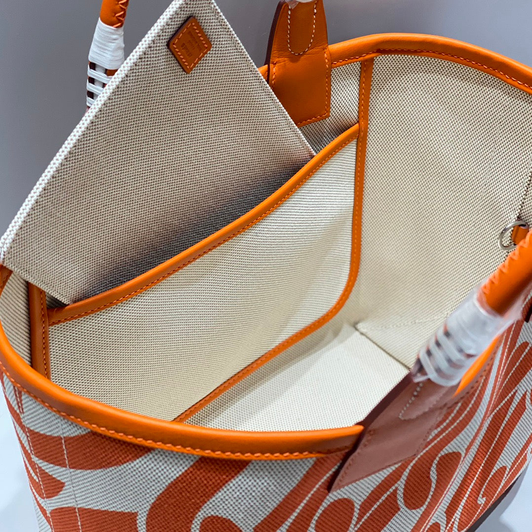 Sac HM Steeple 28 en cuir de veau marron et toile blanche et marron