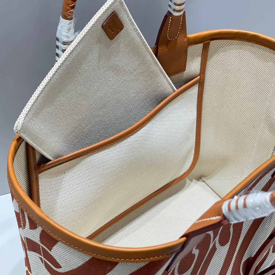 Sac HM Steeple 28 en cuir de veau marron et toile blanche et marron