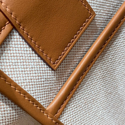 Sac HM Steeple 28 en cuir de veau marron et toile blanche et marron