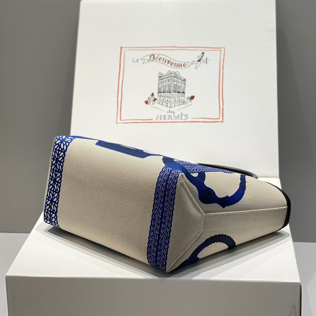 Sac HM Steeple 28 en cuir de veau noir, blanc et bleu, toile