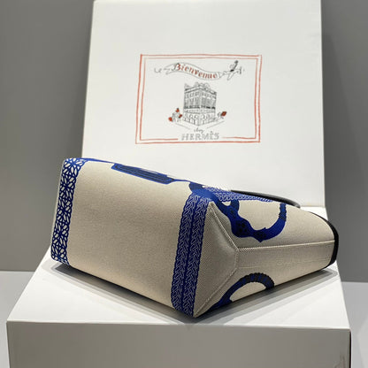 Sac HM Steeple 28 en cuir de veau noir, blanc et bleu, toile