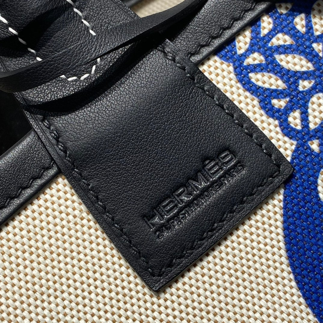 Sac HM Steeple 28 en cuir de veau noir, blanc et bleu, toile