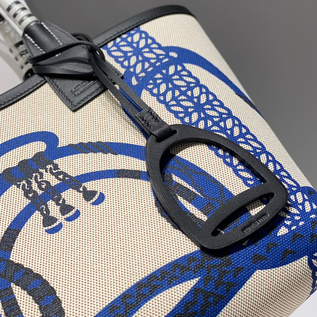 Sac HM Steeple 28 en cuir de veau noir, blanc et bleu, toile