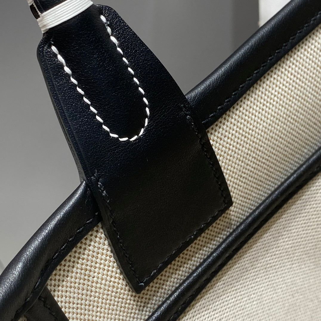 Sac HM Steeple 28 en cuir de veau noir, blanc et bleu, toile