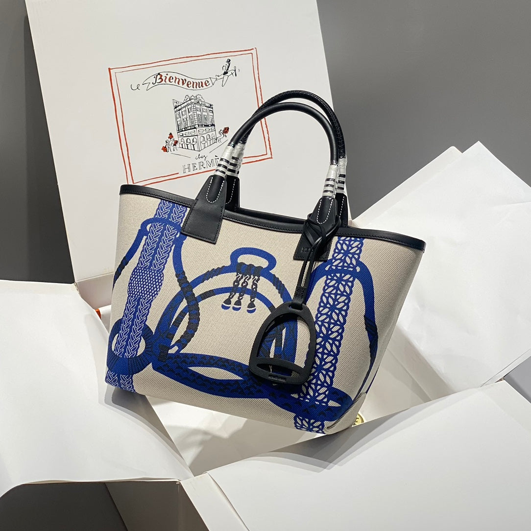 Sac HM Steeple 28 en cuir de veau noir, blanc et bleu, toile