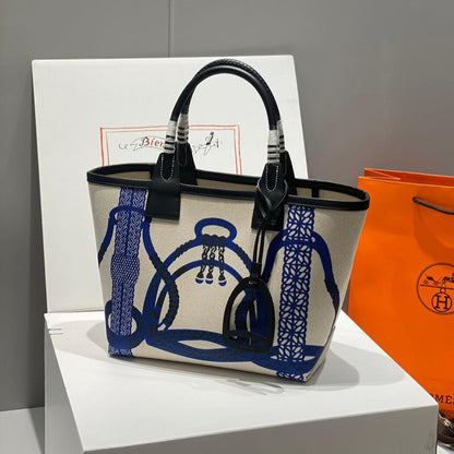 Sac HM Steeple 28 en cuir de veau noir, blanc et bleu, toile