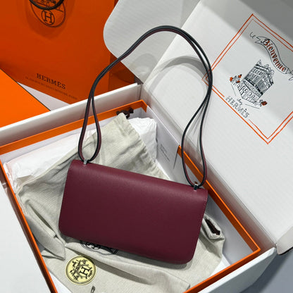 Sac HM Constance Elan 24 cm en cuir Epsom bordeaux et accessoires argentés