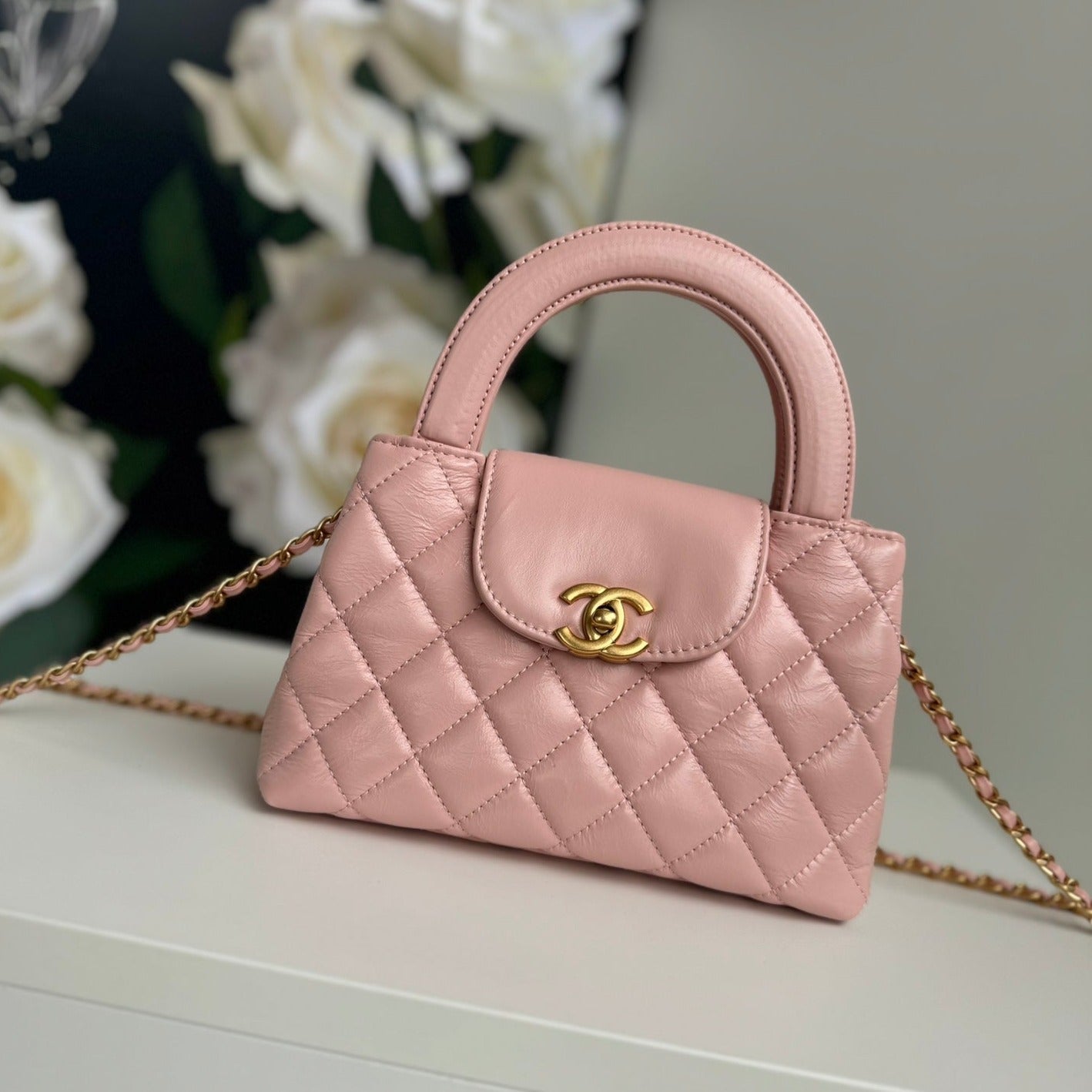 Sac shopping Kelly CC 24A Nano 19 cm en cuir d'agneau rose pastel
