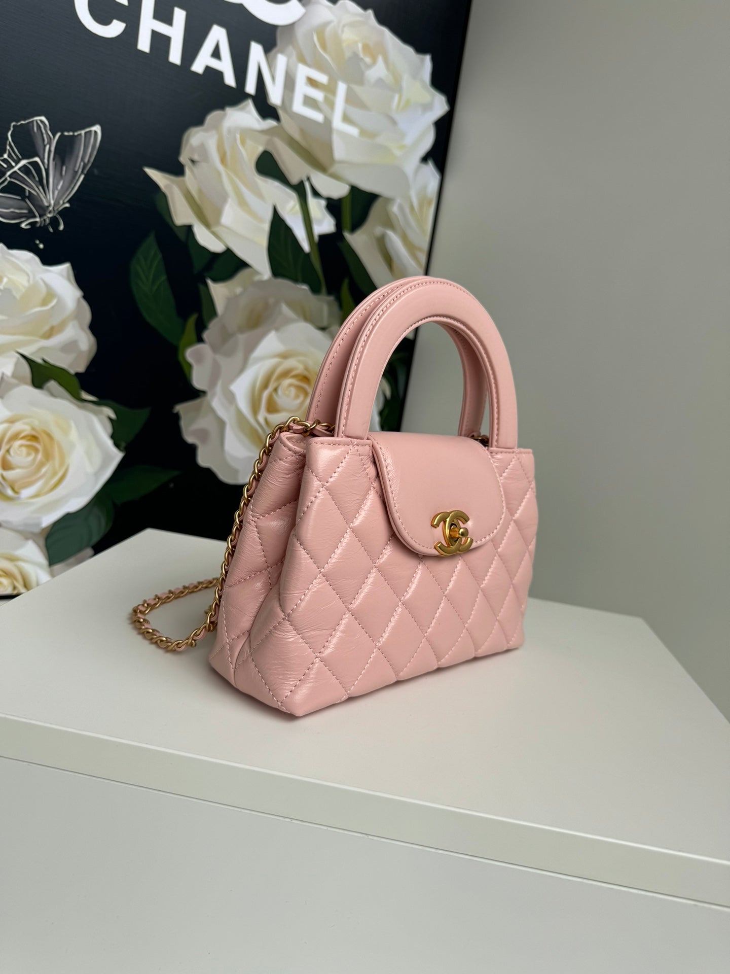 Sac shopping Kelly CC 24A Nano 19 cm en cuir d'agneau rose pastel
