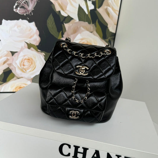 Sac à dos Duma 18 cm en cuir d'agneau noir avec accessoires dorés clairs