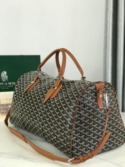 SAC BOSTON 50 EN TOILE GOYARDINE NOIRE ET GARNITURES EN CUIR DE VEAU BRUN