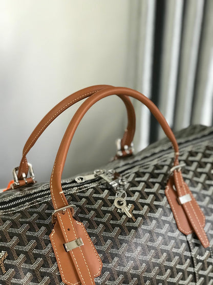 SAC BOSTON 50 EN TOILE GOYARDINE NOIRE ET GARNITURES EN CUIR DE VEAU BRUN