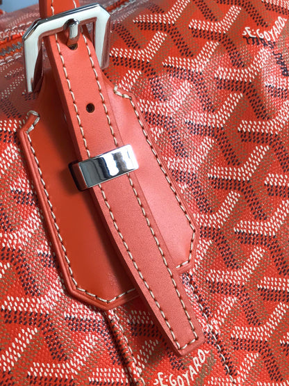 SAC BOSTON 50 EN TOILE GOYARDINE ORANGE ET GARNITURES EN CUIR DE VEAU