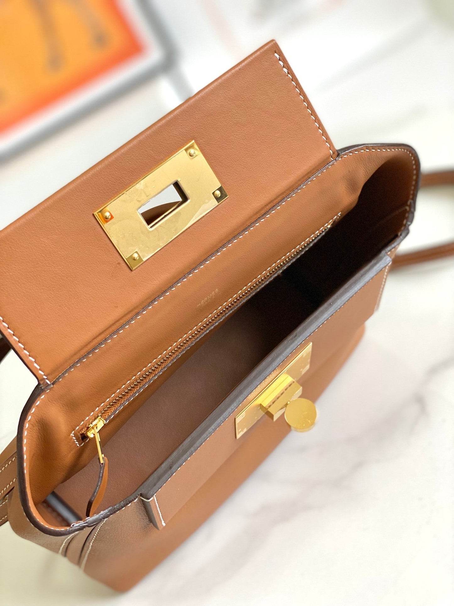Mini sac HM 24/24 21 cm en cuir Evercolor doré et accessoires dorés