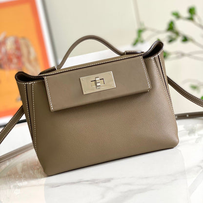 Mini sac HM 24/24 21 cm en cuir étoupe Evercolor, finitions argentées