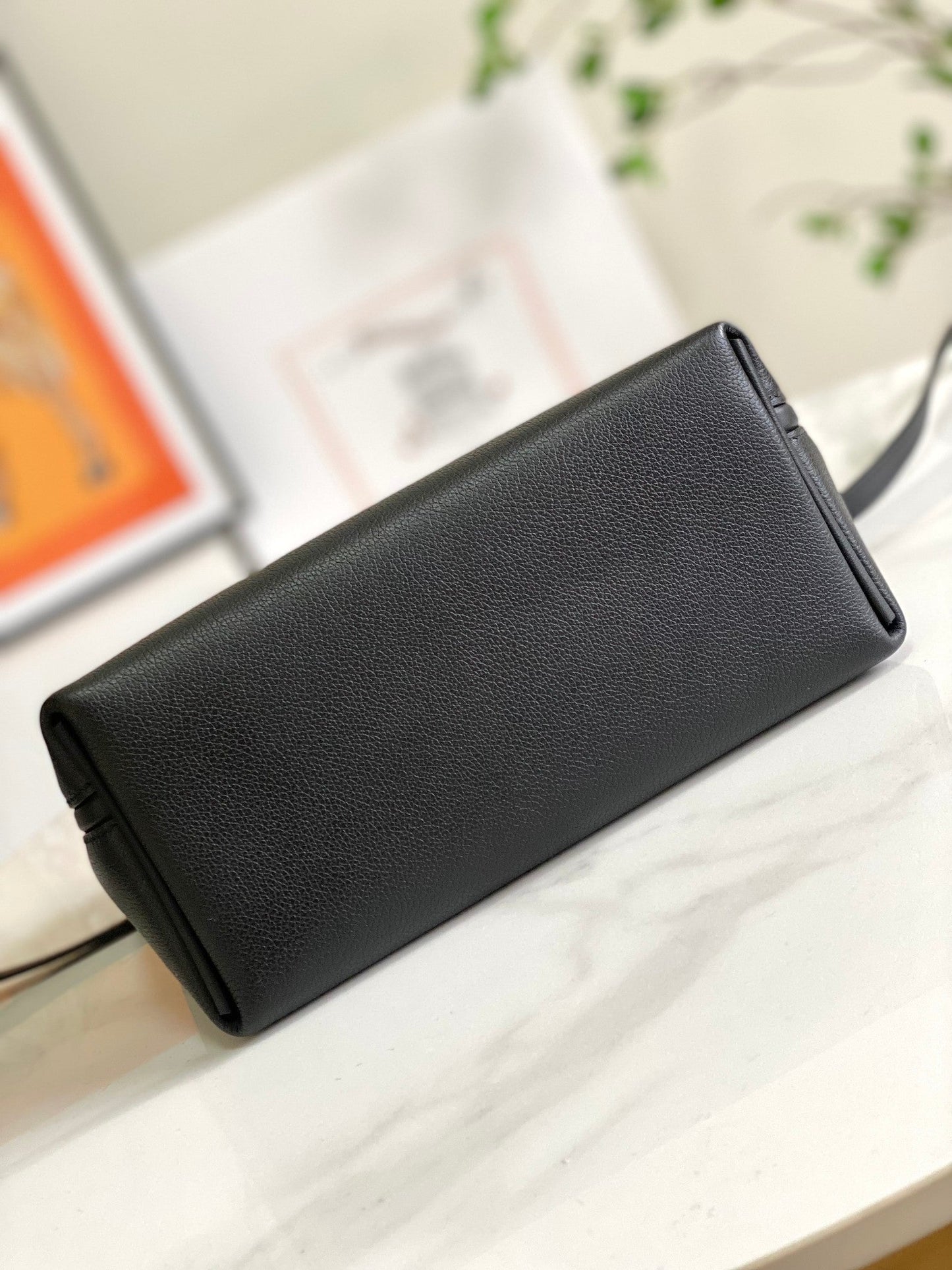 Mini sac HM 24/24 21 cm en cuir noir Evercolor, accessoires argentés