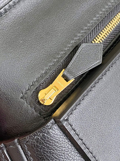 Mini sac HM 24/24 21 cm en cuir noir Evercolor, finitions dorées