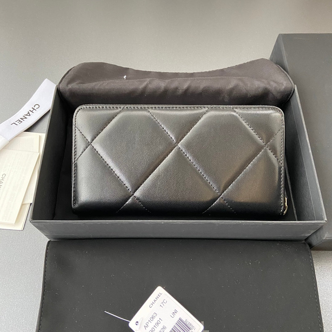 Portefeuille zippé CC 19 19,5 cm en cuir de veau noir et finitions dorées