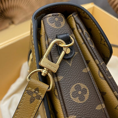 pochette metis 25 monogram reverse canvas