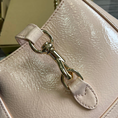 MINI SAC JACKIE NOTTE 19 EN CUIR DE VEAU LAQUÉ CRAQUELÉ ROSE CLAIR, QUINCAILLERIE DORÉE