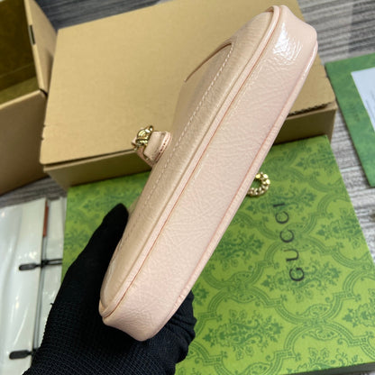 MINI SAC JACKIE NOTTE 19 EN CUIR DE VEAU LAQUÉ CRAQUELÉ ROSE CLAIR, QUINCAILLERIE DORÉE