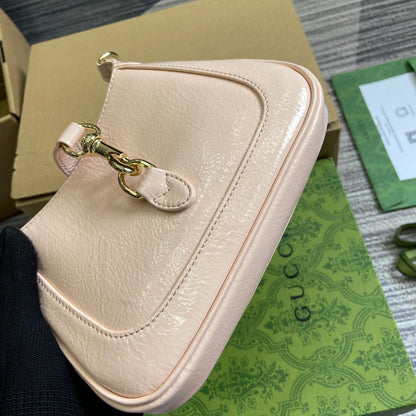 MINI SAC JACKIE NOTTE 19 EN CUIR DE VEAU LAQUÉ CRAQUELÉ ROSE CLAIR, QUINCAILLERIE DORÉE
