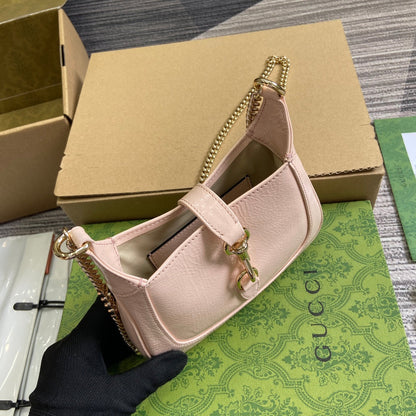 MINI SAC JACKIE NOTTE 19 EN CUIR DE VEAU LAQUÉ CRAQUELÉ ROSE CLAIR, QUINCAILLERIE DORÉE