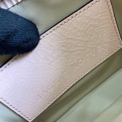 MINI SAC JACKIE NOTTE 19 EN CUIR DE VEAU LAQUÉ CRAQUELÉ ROSE CLAIR, QUINCAILLERIE DORÉE