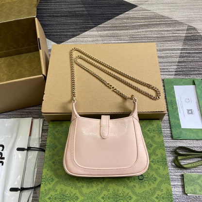 MINI SAC JACKIE NOTTE 19 EN CUIR DE VEAU LAQUÉ CRAQUELÉ ROSE CLAIR, QUINCAILLERIE DORÉE
