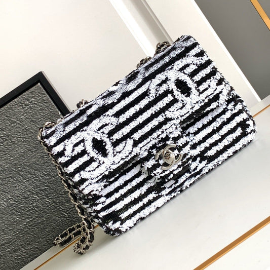 sac à rabat moyen 25 noir blanc paillettes matériel argenté