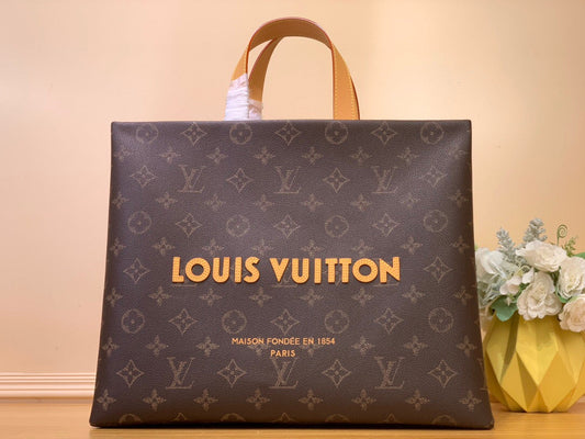 Sac cabas LV Shopper MM 40 cm en cuir de veau monogrammé marron 205583