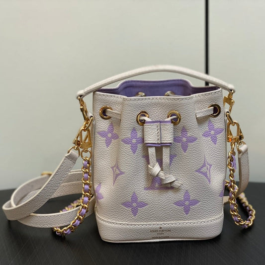 Nano Noe 13 en cuir de veau monogramme violet crème avec finitions dorées