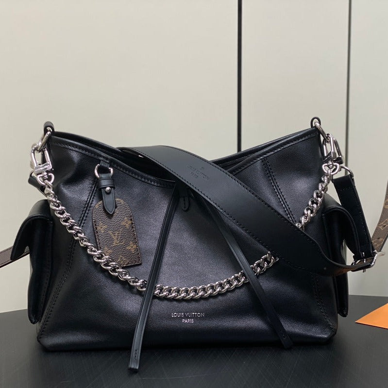 Sac à main Carry All PM 33,5 en cuir noir avec chaîne argentée
