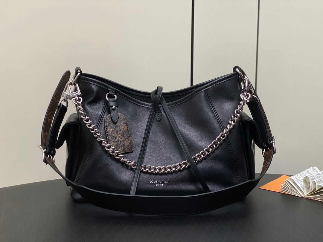 Sac à main Carry All PM 33,5 en cuir noir avec chaîne argentée